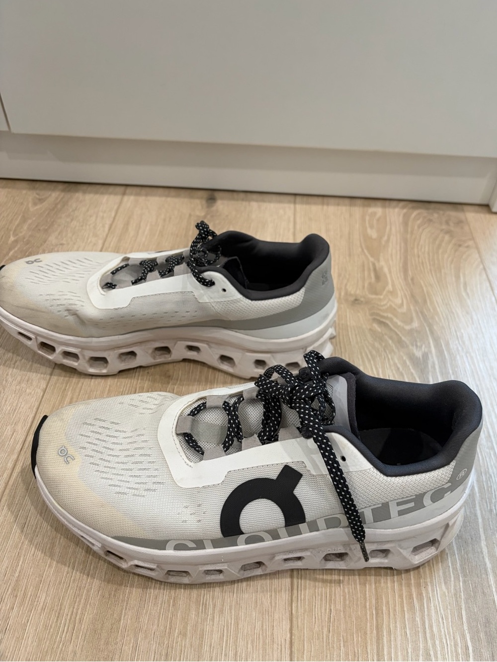 On Cloud Running Sneakers in White and Black
